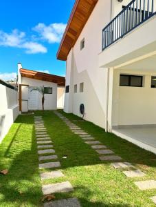 Casa Nova e Moderna a 1 Min da Praia da Lagoinha