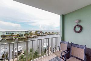 Waterfront condo with bay views pool hot tub boat ramp & private balcony