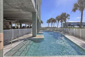 Waterfront condo with bay views pool hot tub boat ramp & private balcony