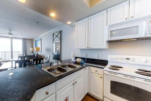 Gulf-front condo with pool sauna washer dryer central AC & gym