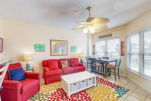 Gulf-front condo with beach access pools hot tub & sports courts