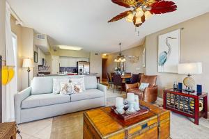 Beachfront condo with shared pool outdoor shower and beach access