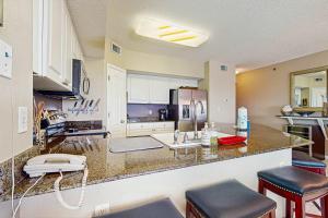 Beachfront condo with shared pool outdoor shower and beach access