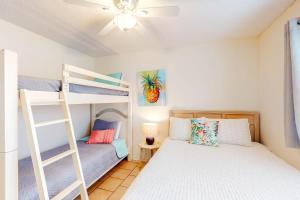 Calming water view condo with full kitchen balcony pool & TV - close to park