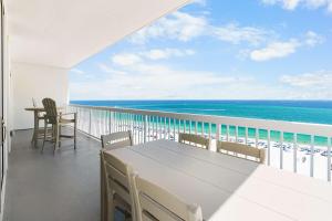 Gulf front condo with pool beach access and wrap around balcony