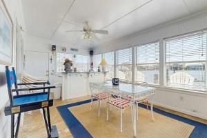 Bayfront home with private dock deck & sleeper porch - dog-friendly