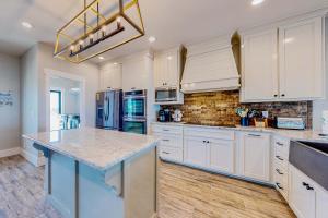 Dog-friendly home with water views & private heated pool