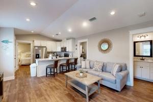 Inviting home near the beach with balcony full kitchen central AC & W&D