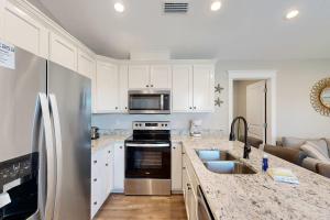 Inviting home near the beach with balcony full kitchen central AC & W&D