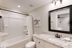 Inviting home near the beach with balcony full kitchen central AC & W&D