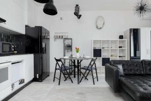 Stylish Apartment Near PGE Narodowy in Warsaw by Noclegi Renters