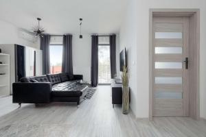 Stylish Apartment Near PGE Narodowy in Warsaw by Noclegi Renters