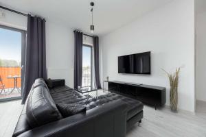 Stylish Apartment Near PGE Narodowy in Warsaw by Noclegi Renters
