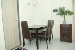 Ivy Downtown Apartment - 1 BHK - Near NESCO and SV Road