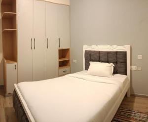 Royal essence apartment with heated swimming pool ,ample parking ,fully equipped gym, child playground and amazing scenic city view
