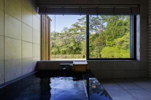 由布岳を望む芝庭と温泉の一棟貸しヴィラ Lento湯布院