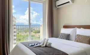 Amanluna Place Mactan - Saekyung Marigondon