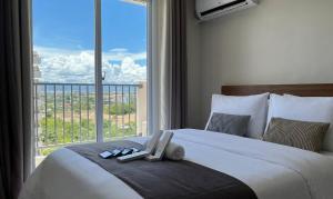 Amanluna Place Mactan - Saekyung Marigondon