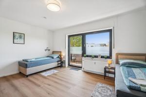 Relax24 - Hochwertiges 2-Schlafzimmer Apartment mit 4 Betten & Balkon