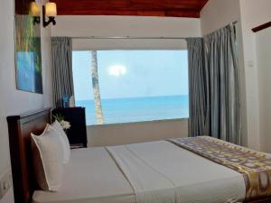 OYO 246 Roy Villa Beach Hotel