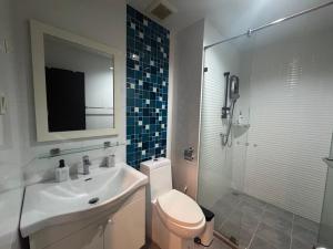 Top floor Panoramic Home in The Sea Condo