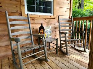 Two Cozy Cabins Nestled in the Trees for a Peaceful Group Getaway near the Great Smoky Mountains National Park in Tennessee