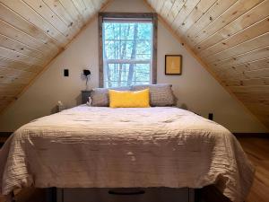 Two Cozy Cabins Nestled in the Trees for a Peaceful Group Getaway near the Great Smoky Mountains National Park in Tennessee