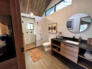 Romantic Lakefront Cabin with Fire Pit near Lake Bastrop, Texas – Luxury Glamping Escape for Couples