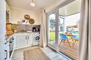 Küstenkojen BLAUE LAGUNE - FeWo 1-5 Pers mit 2 Schlafzimmern, Terrasse und SAUNA