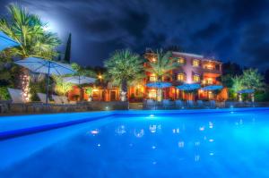 The Palm Garden - Idyllic Pool Apartments in a Green Oasis