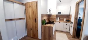Apartament Morska Perła w centrum 900m do morza parking wi-fi plac zabaw