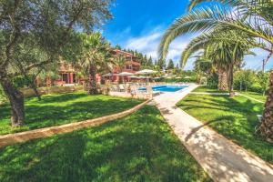 The Palm Garden - Idyllic Pool Apartments in a Green Oasis