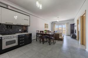 Flower Balcony Apartment | 2BR Beachside Escape by PikHost