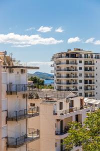 Flower Balcony Apartment | 2BR Beachside Escape by PikHost