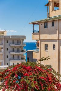 Flower Balcony Apartment | 2BR Beachside Escape by PikHost