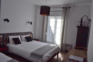 Hotels Hotel La Licorne : photos des chambres