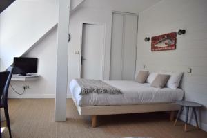 Hotels Hotel La Licorne : photos des chambres