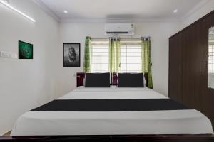 Super OYO Hotel O Ramaraopet Near Kakinada Beach