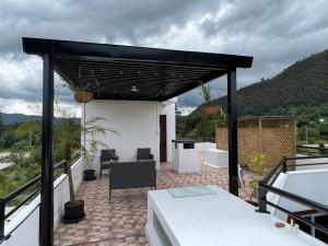 Casa de las Azucenas - Modern 3BR Home with Rooftop & Mountain Views