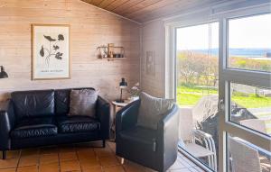 Beach Front Home In Knebel With Sauna