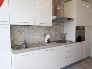 Kennedy house with parking, balcony and 200 m from the sea