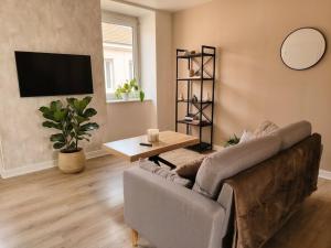 Appartement neuf & élégant à deux pas du marché