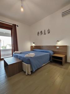 CLASS ROOMS AFFITTACAMERE con bagno privato , vicino alle DUNE di PORTO PINO