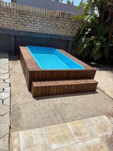 Casinha para 3 pessoas com piscina em comum patio fechado em torres