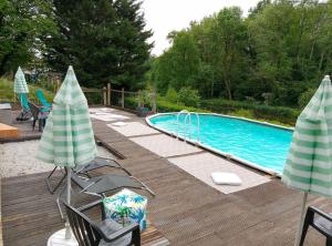 Les Glycines Gîtes - La Roche gîte - shared solar heated pool - garden spa - fenced garden for dogs