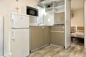 Feriendorf Cisano San Vito Mobilehome Turchese für 7 Personen