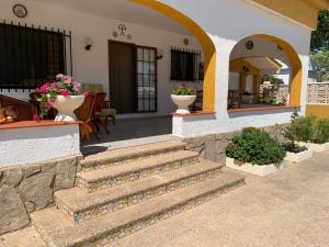 Chalet con piscina playa de Oliva
