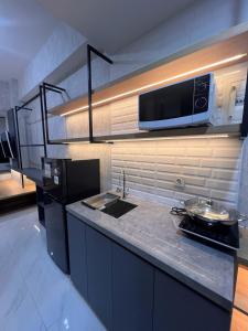 Comfort Studio Pakuwon Residence by Bonzela Property