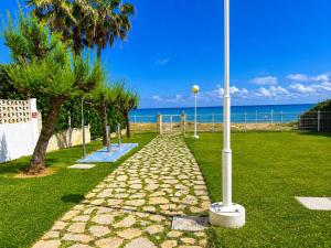 Apartamento Caleta en Dénia primera línea con pista de pádel, piscina y vistas al mar by Family Homes Rentals