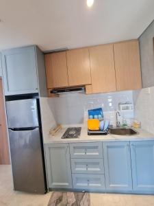 Modern 2 BR Apartment - Puri Orchard Apartment